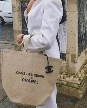 CHANEL Novelty Dans Les Serres Camellia Linen Tote Bag with Charm