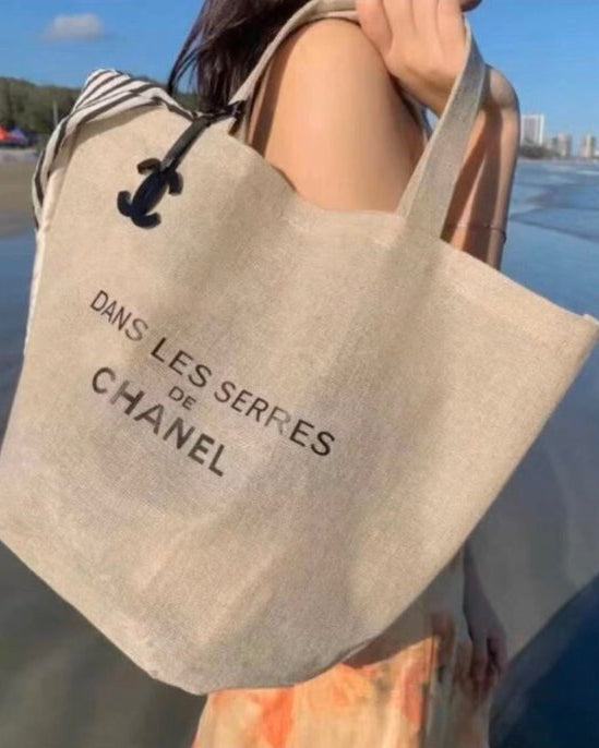 CHANEL Novelty Dans Les Serres Camellia Linen Tote Bag with Charm